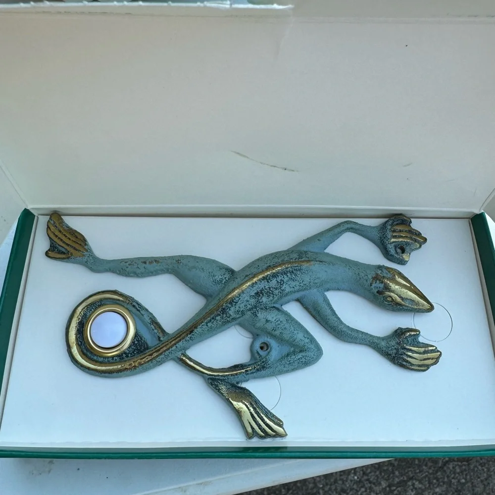 Vintage flora and fauna doorbell solid brass.
